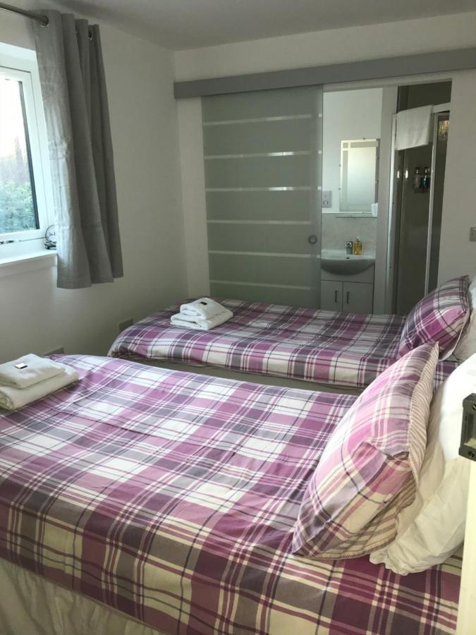 Corran Bunkhouse Hotel Exterior photo A room at the station